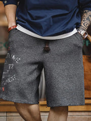 船の錨のデザインと破壊加工が施された航海柄のショートパンツの前面画像。ナチュラルでユニークなデザインが際立っています。