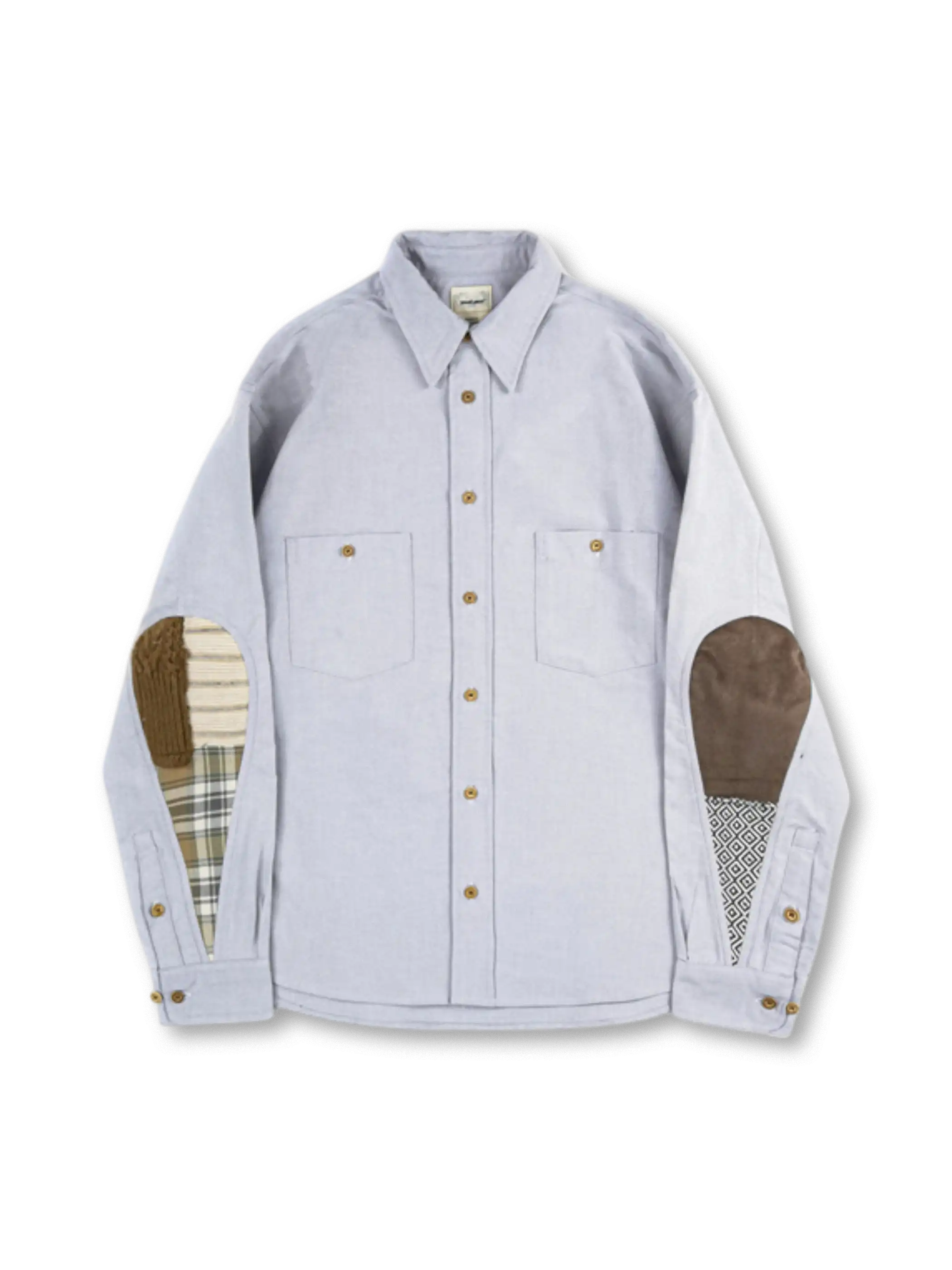 水滴型パッチワークが施されたオックスフォードシャツ全体像。肘部分のパネルが特徴的