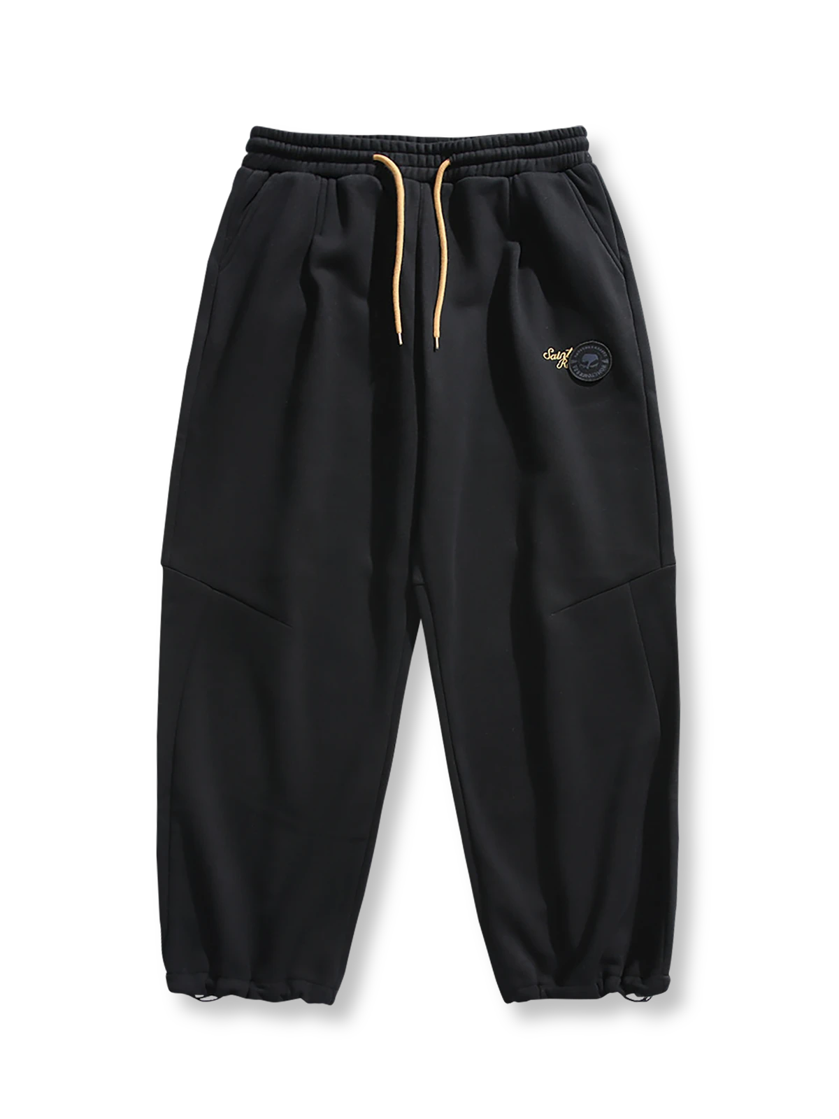 製品画像: 4色展開 カジュアル スウェットパンツ。裏起毛素材とルーズフィットデザインを採用した、冬に最適な厚手スウェットパンツの正面全体展示図。

詳細画像: 柔らかい裏起毛素材の質感と、冷気を防ぐ裾のリブデザインのディテールクローズアップ。