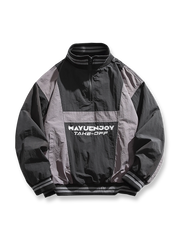 製品画像: バイカラー パッチワーク ハーフジップ ワイドシルエット プルオーバージャケット、軽量で防風性と通気性を備えたデザイン。レトロなカジュアルスタイルにぴったりの日常やアウトドア向けジャケットの正面全体展示図。

詳細画像: クラシックなバイカラーパッチワークとスムーズな着脱を可能にするハーフジップ仕様、伸縮性のある袖口の防風ディテールクローズアップ。