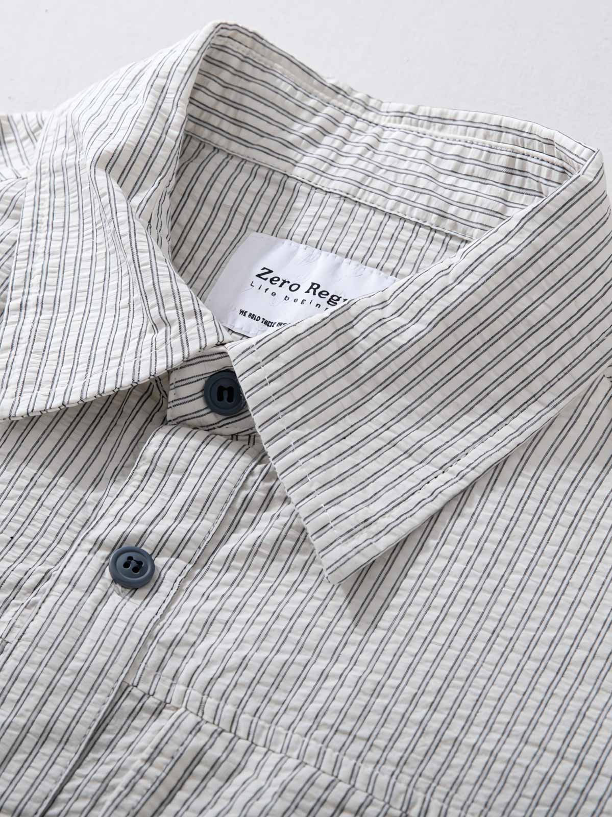 製品画像: ワークパッチワークシアサッカーヴィンテージシャツの全体展示 詳細画像: 肘部分のコントラストカラーパッチのディテール展示