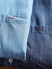 製品画像: 涼感テンセル素材を使用したアメリカンヴィンテージスタイルのデニム半袖シャツ
詳細画像: バイオ加工による滑らかな生地と微アーチ型裾のディテール