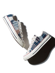 製品画像: 植物染め古布手作り刺し子パッチワーク1970Sローカットキャンバスシューズの正面画像。手工芸とヴィンテージデザインの融合が特徴的。
詳細画像: 刺し子と侗族（ドン族）の手織り布のディテール特写。伝統技術の細部が見える画像。