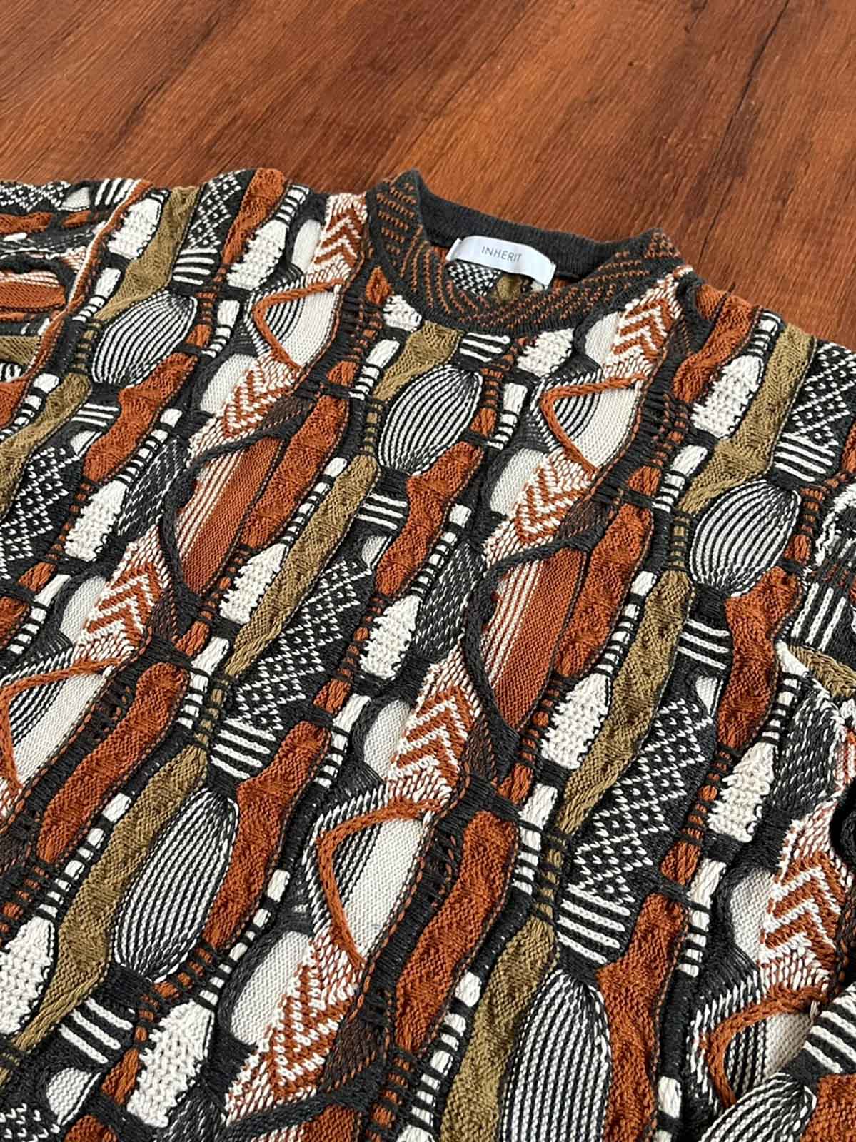 詳細画像: セーターの立体的なゴーヤ柄と編み込みのディテール