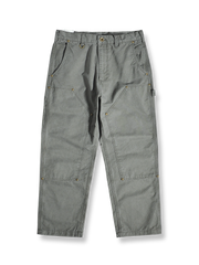 ハンティングワークパンツの平置き画像 - 丈夫なデザインと多機能ポケット