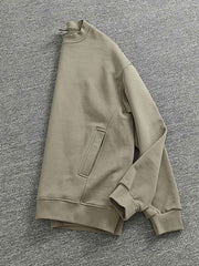 スウェットの袖口とパッチワークディテール - 独特な質感を強調