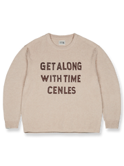 製品画像: 透かしロゴ刺繍ロールドヘムニットセーター、正面展示、ヴィンテージ感あふれるデザイン
詳細画像: 透かし刺繍ロゴとナチュラルロールドヘムのディテール特写、細部の精巧さを強調