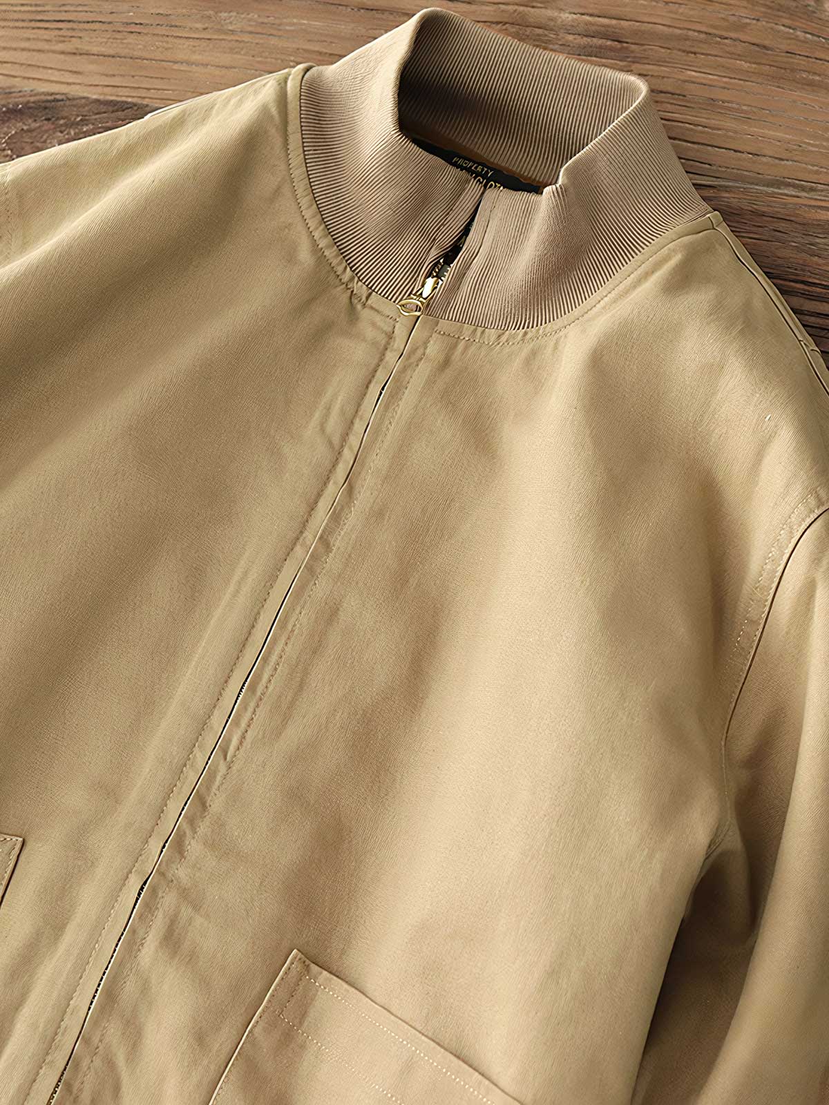 製品画像: 裏起毛 防寒 ミリタリー タンカージャケット 正面
詳細画像: TALONジッパーとトリコロール刺繍ワッペン ディテール