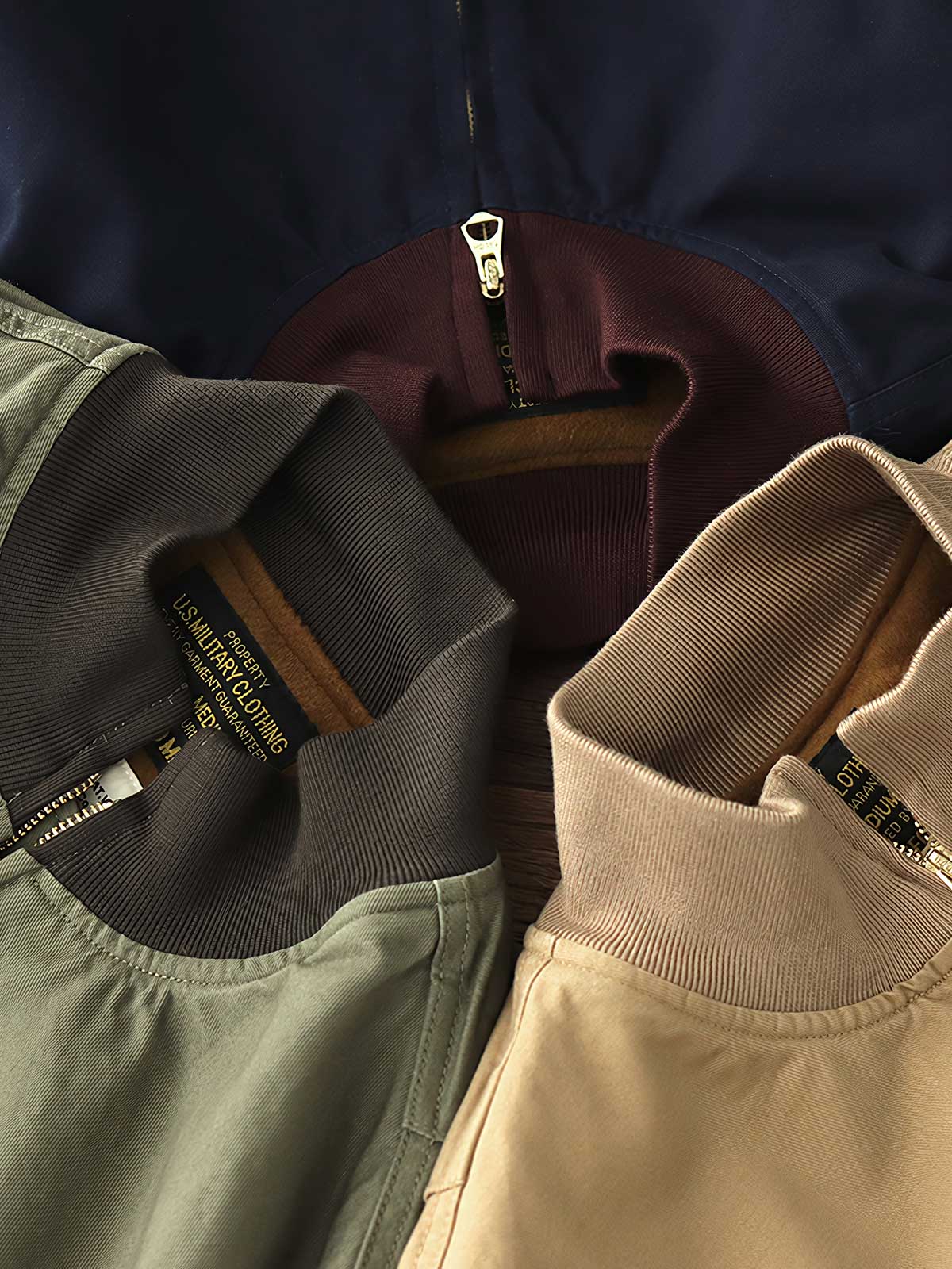 製品画像: 裏起毛 防寒 ミリタリー タンカージャケット 正面
詳細画像: TALONジッパーとトリコロール刺繍ワッペン ディテール