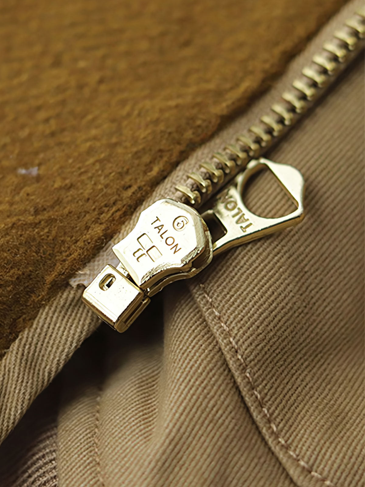 製品画像: 裏起毛 防寒 ウォッシュツイル コンバットジャケット 正面
詳細画像: TALON真鍮ジッパーとリブスタンドカラー ディテール