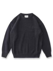 製品画像：ゆったりとしたワッフル編みクルーネックセーターの正面展示。ヴィンテージ風のデザインがカジュアルなスタイルにぴったり。
詳細画像：立体感のあるワッフル編みのディテールをクローズアップ。柔らかさと耐久性を兼ね備えたダブルヤーン素材。