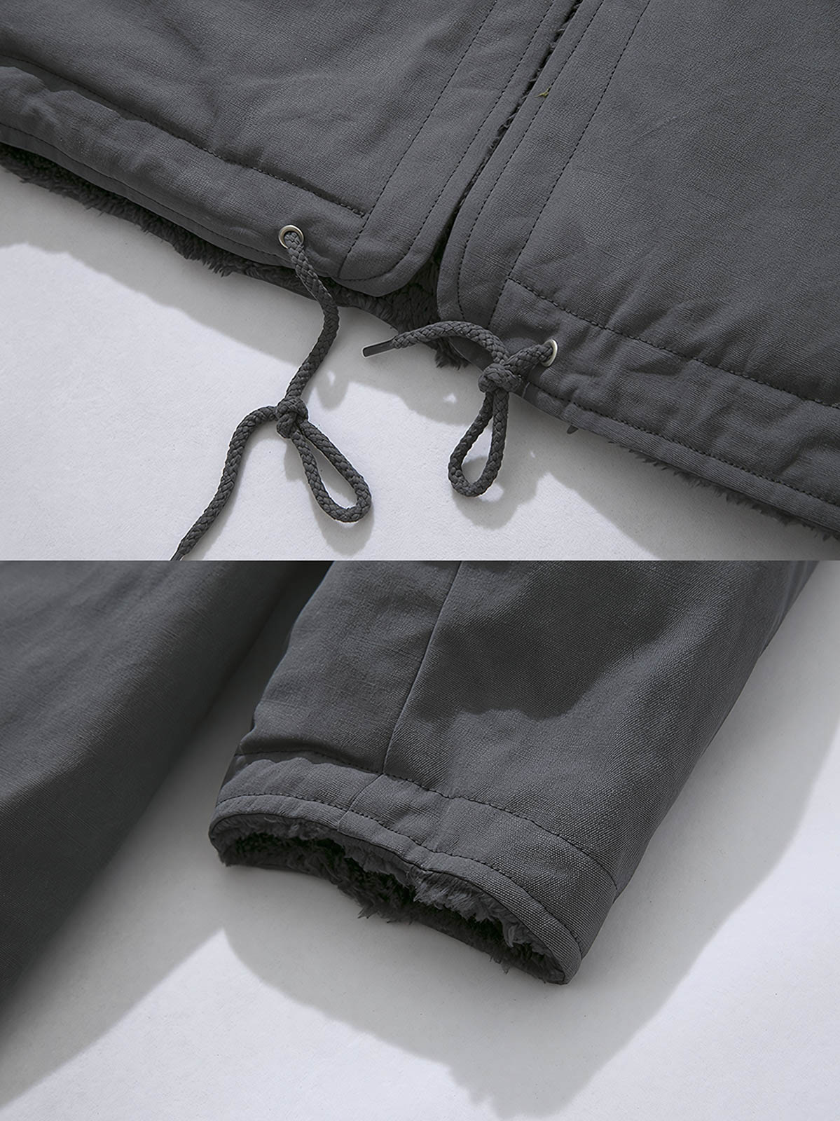 製品画像: リバーシブル厚手コーラルフリースヴィンテージワークコート全体表示。コットン表地とコーラルフリース裏地の組み合わせで、保温性とスタイルを両立したデザイン。

詳細画像: スタンドカラーとフリース裏地のディテール表示。すっきりとしたシルエットと柔らかいフリース素材が特徴。