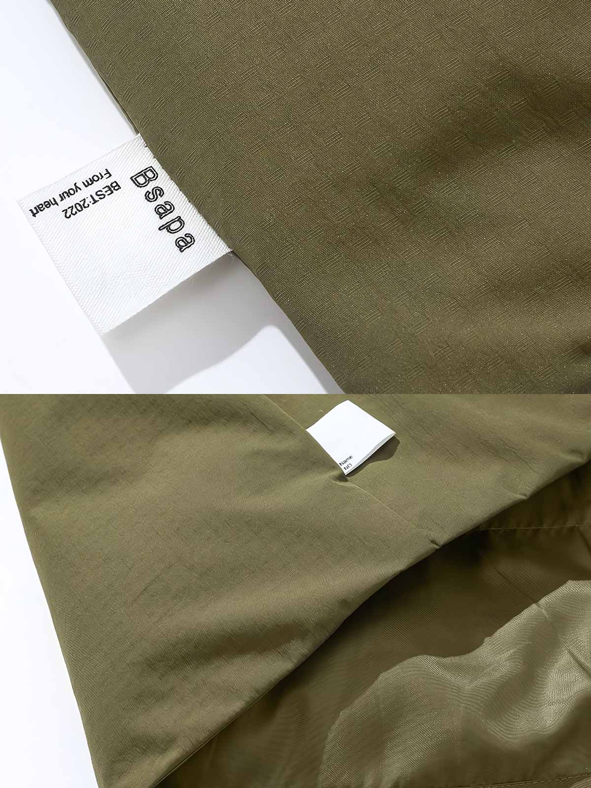 製品画像: アウトドア用ヴィンテージVネックワークジャケット全体展示。厚手で保温性のあるデザインが特徴。

詳細画像: Vネックとジップポケットのディテール展示。立体感と実用性が高いポケットが映えるデザイン。