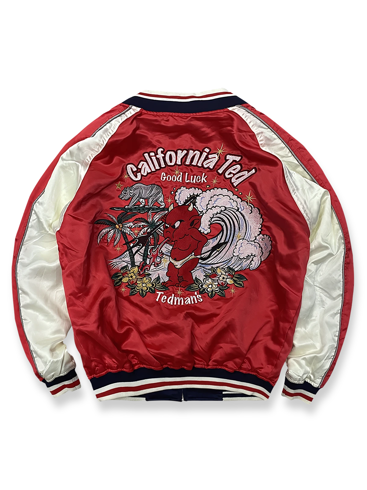 製品画像: リバーシブル シルク刺繍 横須賀 テッドマン 酒吞童子 ジャケットの全体画像、幸運を象徴する赤鬼と伝統的な刺繍デザイン

詳細画像: テッドマン（幸运の赤鬼）と酒吞童子の刺繍ディテール、横須賀刺繍の高度な技法で施されたアート