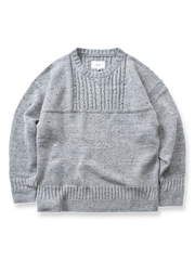 製品画像
カラードットケーブル編みウールセーターの全体画像。レトロなカラードットデザインが特徴的なケーブル編みのニットセーターは、秋冬シーズンにぴったりのアイテム。

詳細画像
セーターのケーブル編みディテールとカラードットデザインが特徴的。ウールとポリエステルの混紡素材で温かさと快適さを提供し、秋冬のコーディネートに最適。