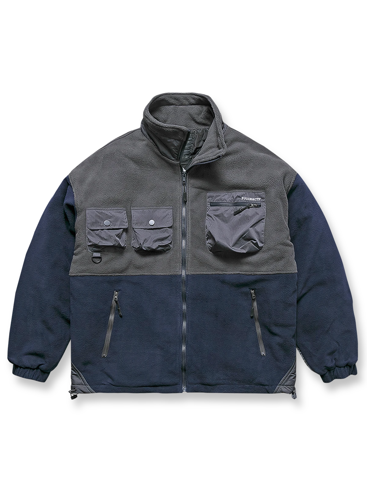 製品画像
カラーブロックフリースジャケットの正面画像。カラーブロックデザインが特徴的な、軽量で保温性に優れたフリース素材を使用した秋冬向けの多ポケットジャケット。

詳細画像
フリース素材を使用したカラーブロックデザインの多機能ポケットが特徴的なジャケットのディテール。収納力を高めるポケットと、立ち襟デザインが秋冬の寒さから守ります。