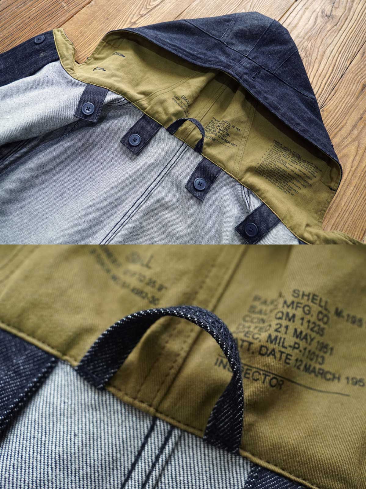 製品画像： デニムバージョンのM51フィッシュテールコート全体イメージ画像。特注のデニム素材で再現されたヴィンテージミリタリースタイルが特徴的。シルバーカラージッパーやブルー樹脂ボタンなど、細部までこだわったデザインが魅力。
詳細画像： YKK製スナップボタンと特注シルバーカラージッパー、ブルー樹脂ボタンのディテールをクローズアップした画像。ヴィンテージ感を引き立てる丁寧なディテールが際立つ。