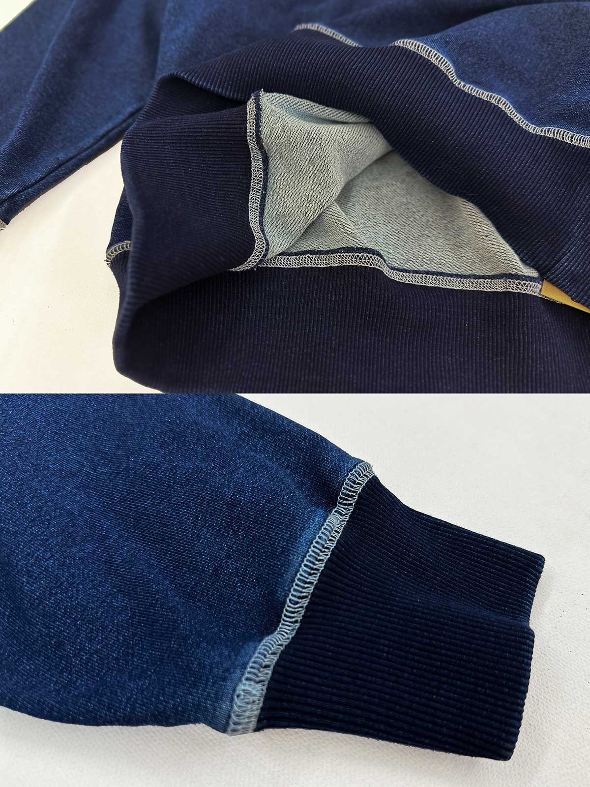 製品画像：藍染めスワローカイト刺繍スウェット、伝統的な藍染め技法と繊細なスワローカイト刺繍が融合した個性的なデザイン。100%コットン素材を使用し、自然なグラデーション効果と肌に優しい着心地が特徴。

詳細画像：スワローカイト刺繍のディテールアップ、藍染め技法による美しいグラデーション効果と、精梳コットン表地とシルク風中綿を使用した高級感あるデザイン。植物染色技法で自然な美しさを強調。