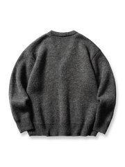 製品画像: ウール混紡 カラーブロック Vネック ニットカーディガンの全体展示画像。カラーブロックデザインがアクセントとなり、フロントポケットやリブ仕上げのディテールが際立つスタイリッシュな一着。軽量で暖かく、日常使いからフォーマルシーンまで対応可能。
詳細画像: フロントポケットとカラーブロック部分の編み目ディテールをクローズアップした画像。繊細な光沢と柔らかな触感を実現したウール混紡素材の質感を強調。リブ仕上げによるフィット感と保温性も確認可能。