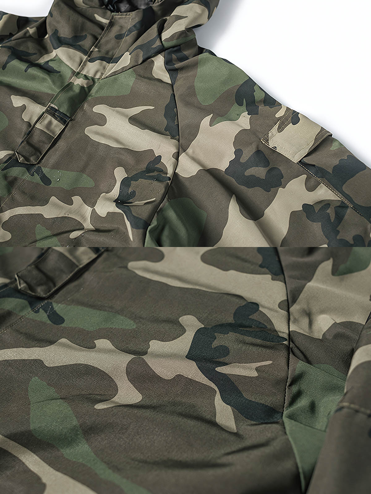 製品画像
多層構造型防寒服、迷彩柄防水ジャケット、ウッドランド迷彩柄、撥水加工、厚手ポリエステル素材、耐久性、アウトドアジャケット、寒冷地対応、風雨対応、耐久性の高い素材。

詳細画像
10号IDEALナイロンジッパー、大型ジッパー、カスタムナイロン製スナップボタン、防風性、耐久性、アウトドアジャケットのディテール、実用的なデザイン。
