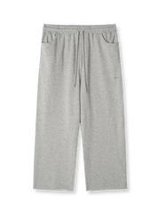 製品画像: レトロなコットン混紡ニットスウェットパンツの全体展示。シンプルなストレートシルエットとロールアップ裾が特徴のカジュアルスウェットパンツ。

詳細画像: ウエスト部分のゴムとドローストリング、裾のロールアップディテール特写。ウエストと裾のデザインが引き立つ特写。