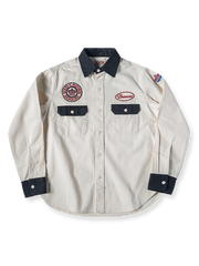 ヴィンテージ刺繍パッチガソリンステーションワークシャツの全体像を展示し、独特なデザインとディテールが強調されています。