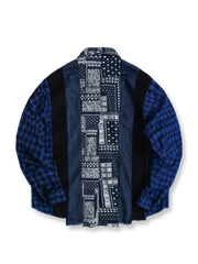 製品画像
「REMAKE パッチワーク アシンメトリーヘム 長袖シャツの正面全体図。藍染め織りのチェック柄、ペイズリー柄、デニム、コーデュロイなど、異素材を組み合わせたブルー系デザインが特徴で、分解・再構築のリメイクスタイルを採用した個性的なシャツ。」

詳細画像
「REMAKE パッチワーク アシンメトリーヘム 長袖シャツの素材ディテール特写。藍染め織りのチェック柄やペイズリー柄、デニム、コーデュロイなど6種類の異素材を組み合わせたパッチワークと、動きのあるアシンメトリーヘムのクローズアップ。袖部分には調節可能なタブも配置。」
