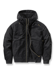 製品画像
「M-65戦闘服デザインをリバイバルしたウール裏地厚手フード付きジャケットの全体画像。フード付きと多ポケット仕様が特徴の冬用アウター。」

詳細画像
「大容量ポケットと防風キャンバス生地の外層、保温性に優れたウール裏地のディテールをクローズアップした画像。」