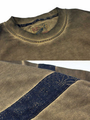 製品画像
泥染めクルーネックスウェットの全体展示。自然な色ムラと独特な泥染め加工が特徴的なヴィンテージスタイルの一着。

詳細画像
泥染めの独特な風合いとヘビーウェイトコットンの質感を強調したディテール特写。色ムラと自然な陰影がヴィンテージ感を際立たせています。