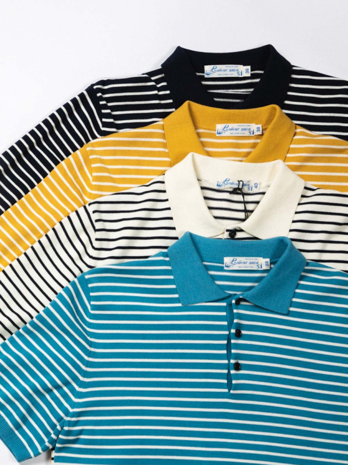 ストライプデザインと天然シェルボタンの詳細