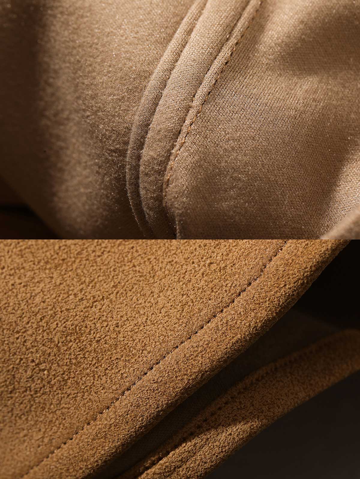 製品画像: カーキ色のスエード調ウエスタンシャツの正面展示
詳細画像: ビーズ装飾と狼モチーフのディテール展示