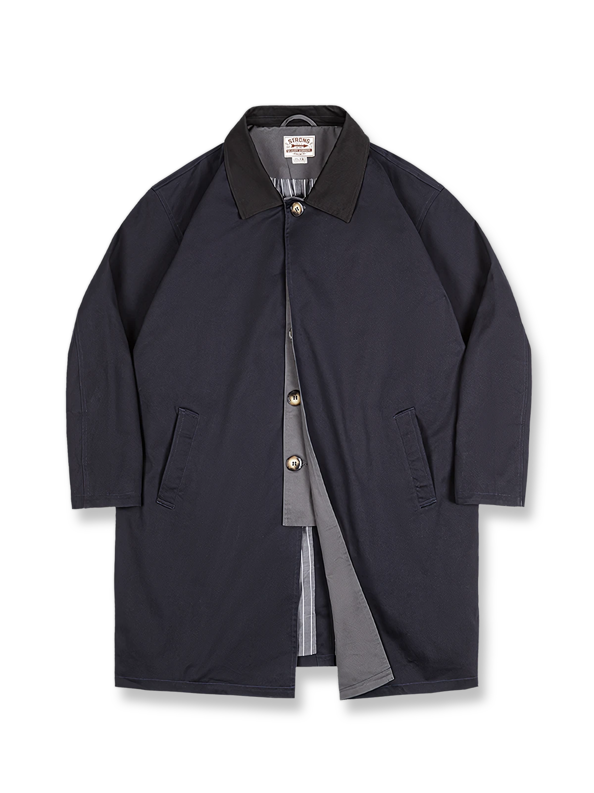 製品画像: クラシックデザインのバルマカーン中長コートの正面ビュー、通勤に最適な全天候対応コート
詳細画像: 配色されたカラー（襟）とフライフロント、一文字型斜めポケットのディテール、上品で洗練されたデザイン