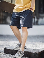 モデルが着用したアメリカンレトロ大きめポケット防水ショーツ