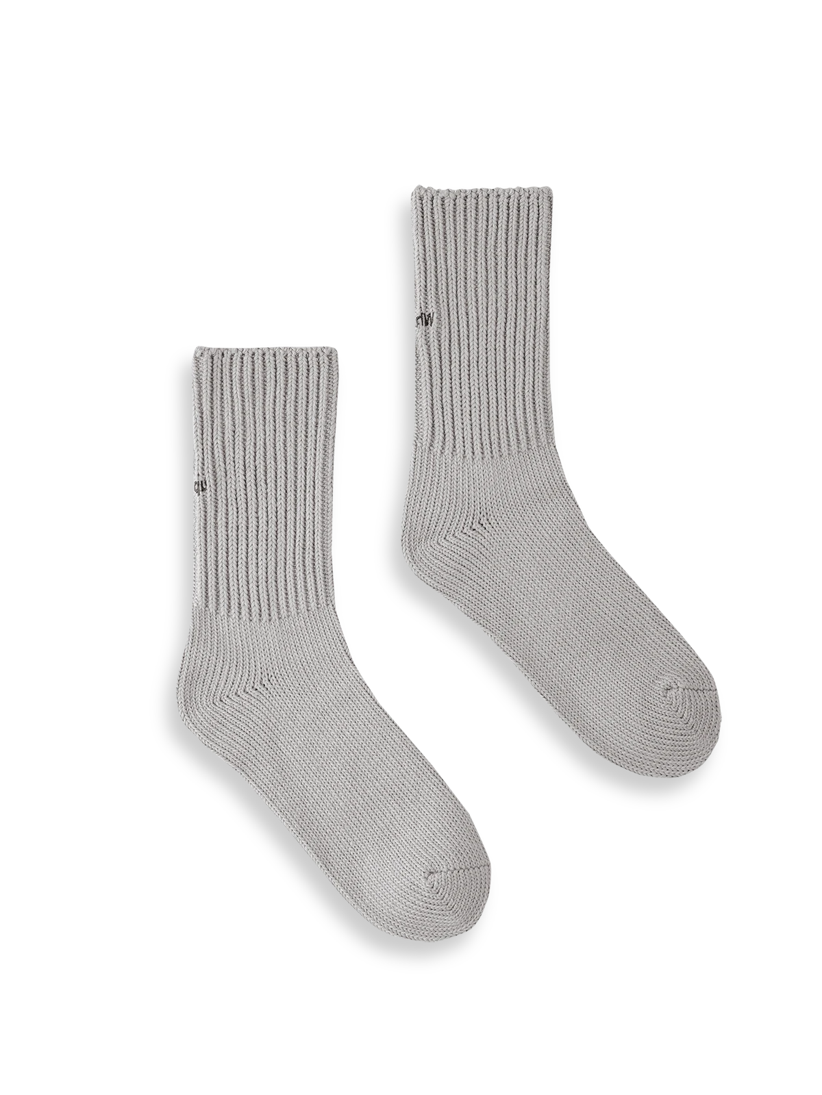 製品画像: ヴィンテージ風ヘビーゲージ刺繍ニットクルーソックスの全体展示。高品質なデザインと快適な履き心地。
詳細画像: かかと部分に施された「What's Up」刺繍のディテール展示。