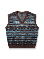 製品画像：
ナバホ風幾何学模様を取り入れたVネックニットベスト。ジャガード技法による立体感とヴィンテージ感が特徴。100%コットンの柔らかなニット素材で、通年着用可能。

詳細画像：
ナバホ風の幾何学模様がデザインのポイント。Vネックデザインで、シャツやタートルネックとのレイヤードスタイルが楽しめます。肌触りの良い100%コットン素材。