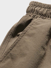 裾絞り 立体ポケット付きスラックス