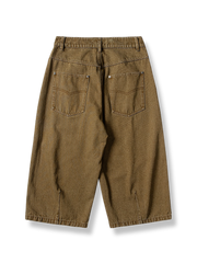 製品画像: 白い七分丈ストレートパンツの反面図