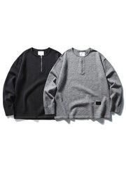 製品画像ALT代替テキスト
ヴィンテージ風ゆったりニットスウェットシャツ、ラウンドネックとハーフジップデザインの全体展示。

詳細画像ALT代替テキスト
ハーフジップディテールと袖口デザインが際立つニットスウェットシャツのディテール。