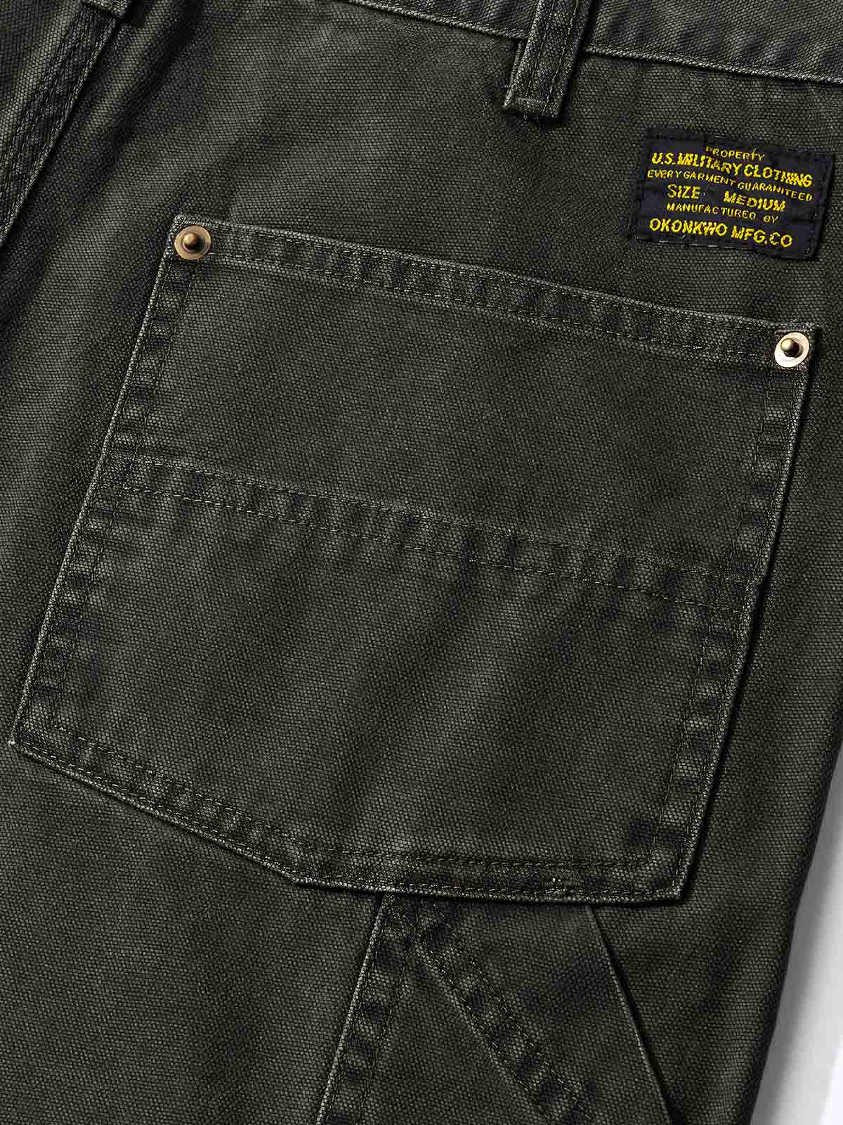 製品画像: 4色展開のWabashストライプロガーパンツ。クラシックなWabashストライプデザインと高耐久性の12oz帆布素材を使用し、アウトドアや作業シーンに最適な実用的でスタイリッシュなアイテム。

詳細画像: Wabashストライプの独特なドット柄と、膝部分の強化布ディテール。耐摩耗性に優れ、長時間の使用にも耐えるデザイン。