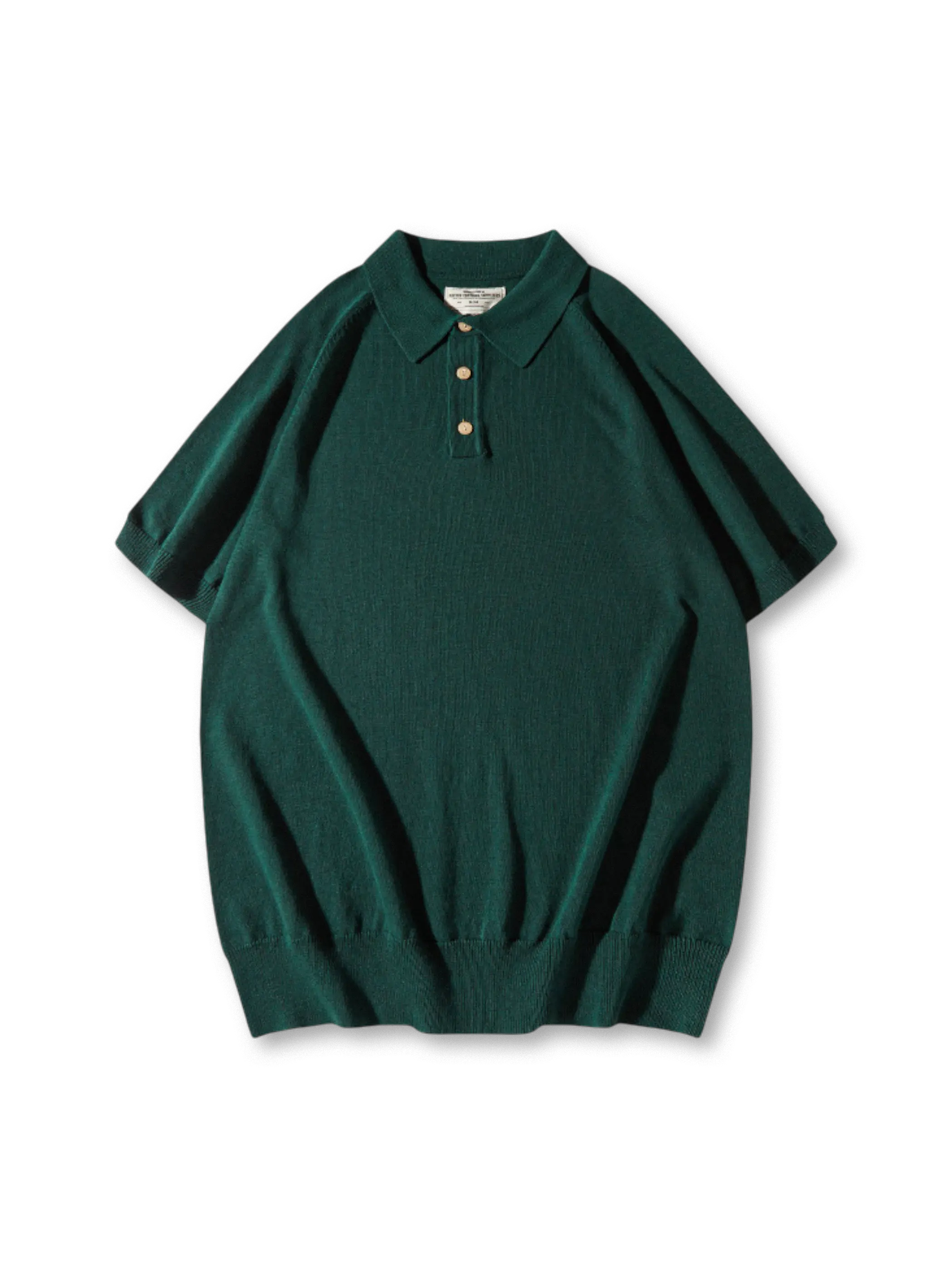 リブ編みの凹凸と七つ穴襟のディテールクローズアップ
