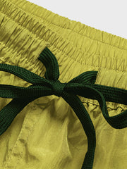 メタリックナイロン刺繍付きショートパンツ