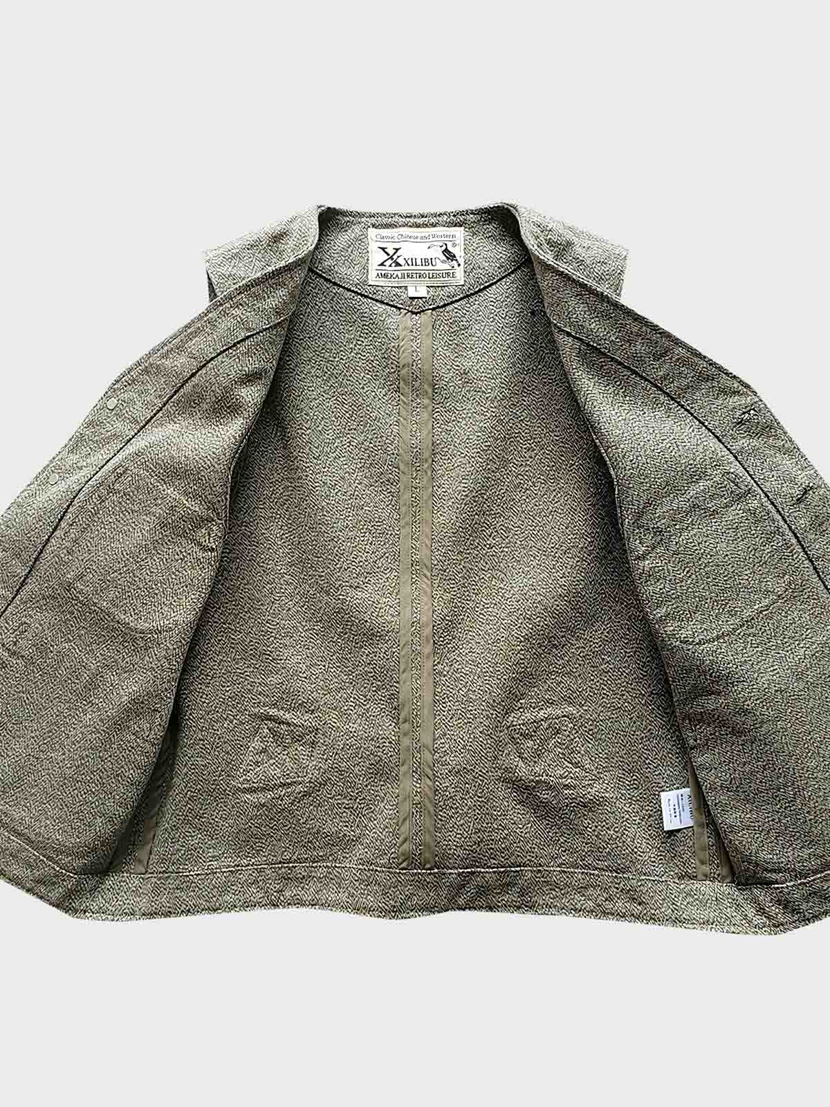 ディテールクローズアップ：ペッパーソルトベストの織りテクスチャと多機能ポケット、滑らかな内側仕様