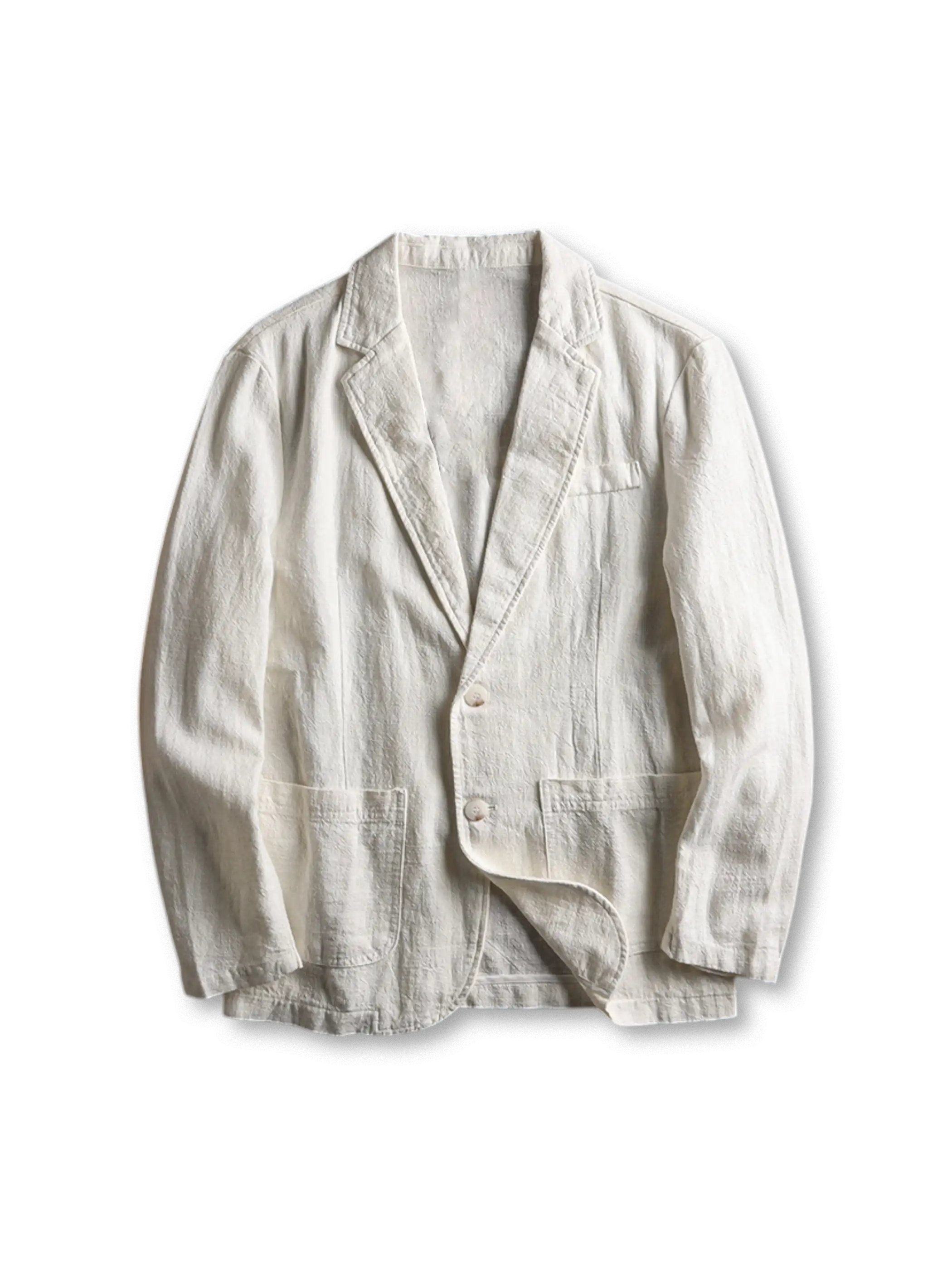 リネンブレンドのテーラードジャケット、フロントに二つボタンとパッチポケットが見える