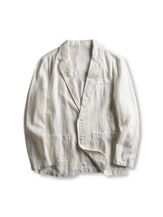 リネンブレンドのテーラードジャケット、フロントに二つボタンとパッチポケットが見える