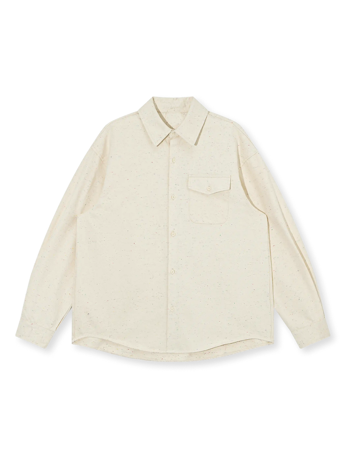 色糸入り綾織りコットンツイルのスプラッシュスピークル生地とワイドシルエットが特徴のシャツ