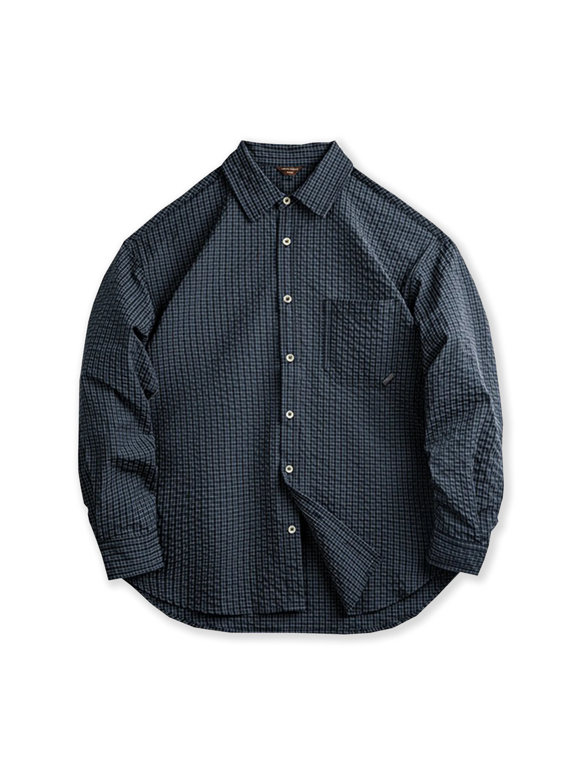 シアサッカー生地と肘あてパッチが特徴の、耐久性とヴィンテージ感を兼ね備えたアメリカンヴィンテージチェックシャツ。