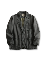 ウォッシュ加工コットンキャンバスとワークポケットが特徴のヴィンテージ風ルーズシルエットブレザー