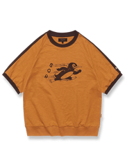 ペンギンとトーレンのアニメ柄抜染プリントが施されたスウェット風ショートスリーブTシャツ