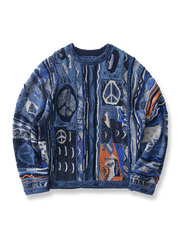 反戦テーマを藍染めウォッシュ加工で表現したニット。