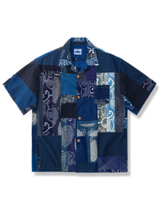 藍染め古布のパッチワークと竹ボタンが特徴のゆったりシルエットシャツ。